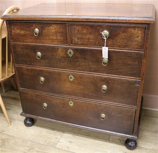 An early to mid 19th century oak chest of drawers, W.95cm